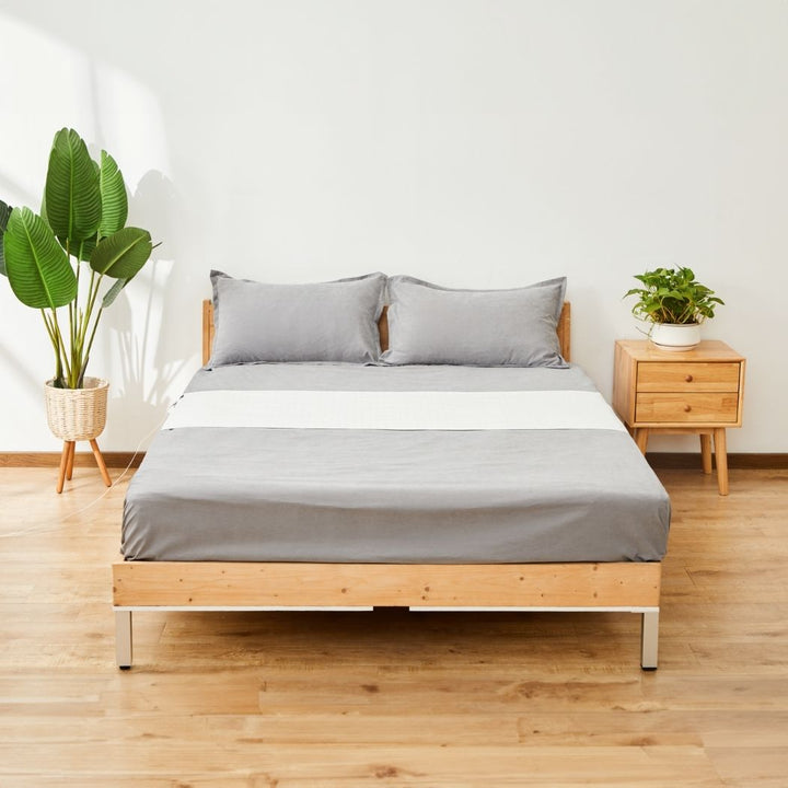 Grounding Bed Sheet with Detachable Grounding Cord and Breathable Low-Profile Fabric
