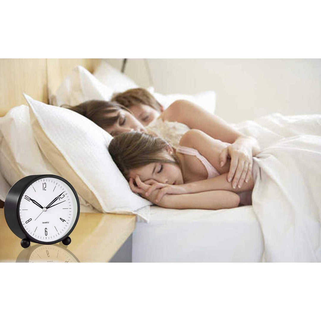 Compact Analog Alarm Clock with Silent Second Hand and Yellow Night Light