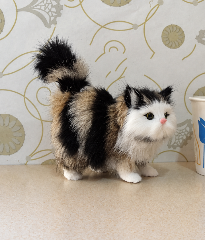 Black and White Plush Cat with Lifelike Features