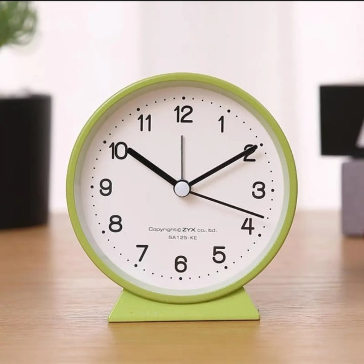 Compact Analog Alarm Clock with Silent Second Hand and Yellow Night Light