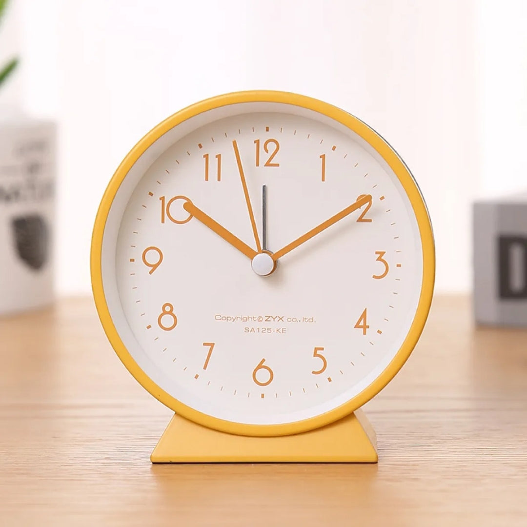Compact Analog Alarm Clock with Silent Second Hand and Yellow Night Light