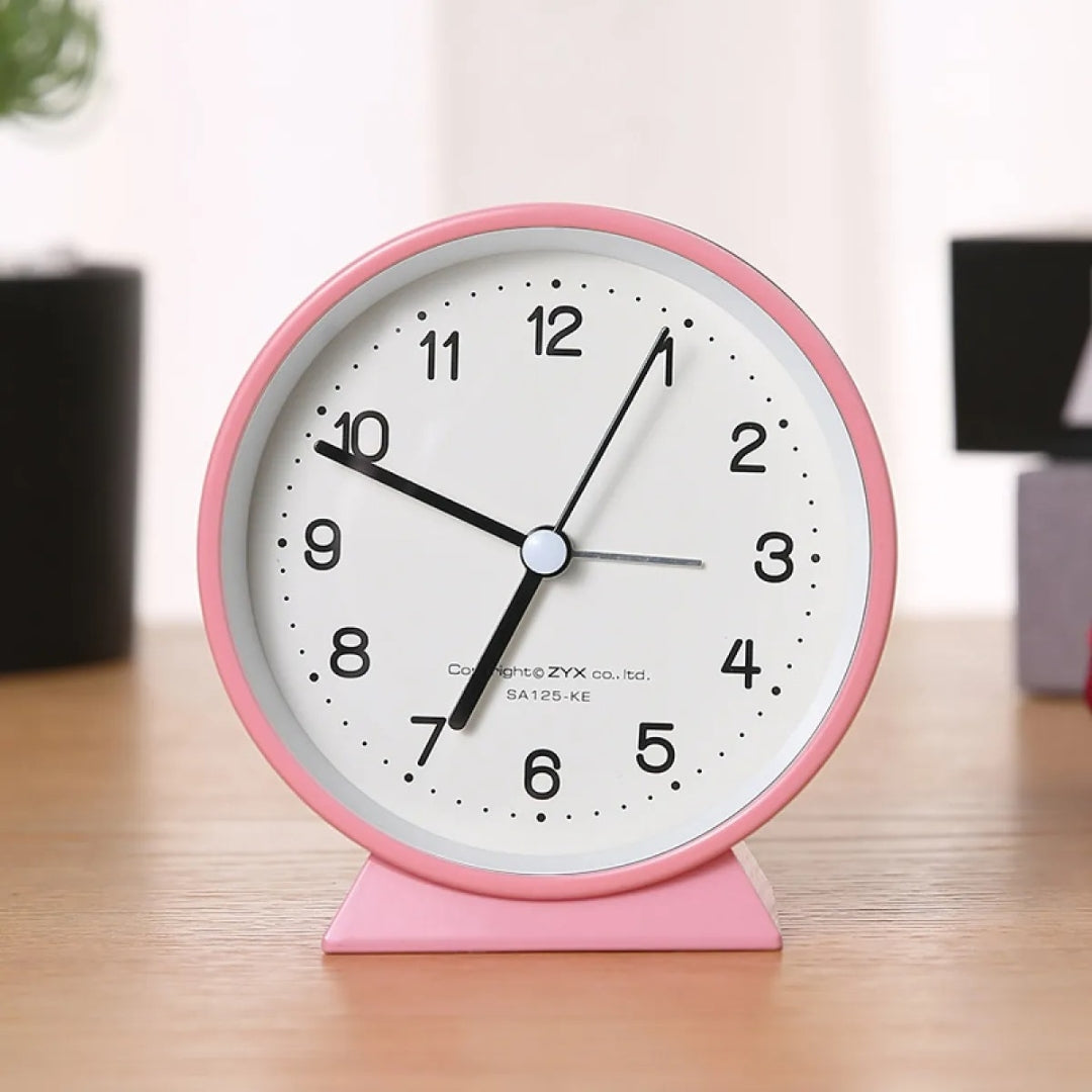 Compact Analog Alarm Clock with Silent Second Hand and Yellow Night Light