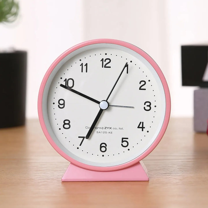 Compact Analog Alarm Clock with Silent Second Hand and Yellow Night Light
