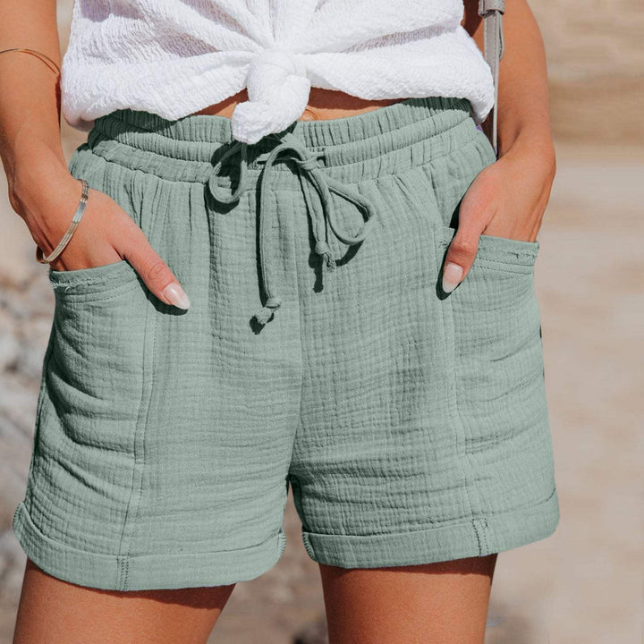 Relaxed Mid-Thigh Shorts with Drawstring Waist and Side Pockets